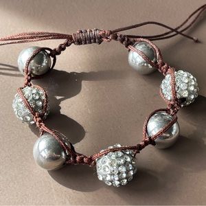 Silver crystal and brown corded bracelet